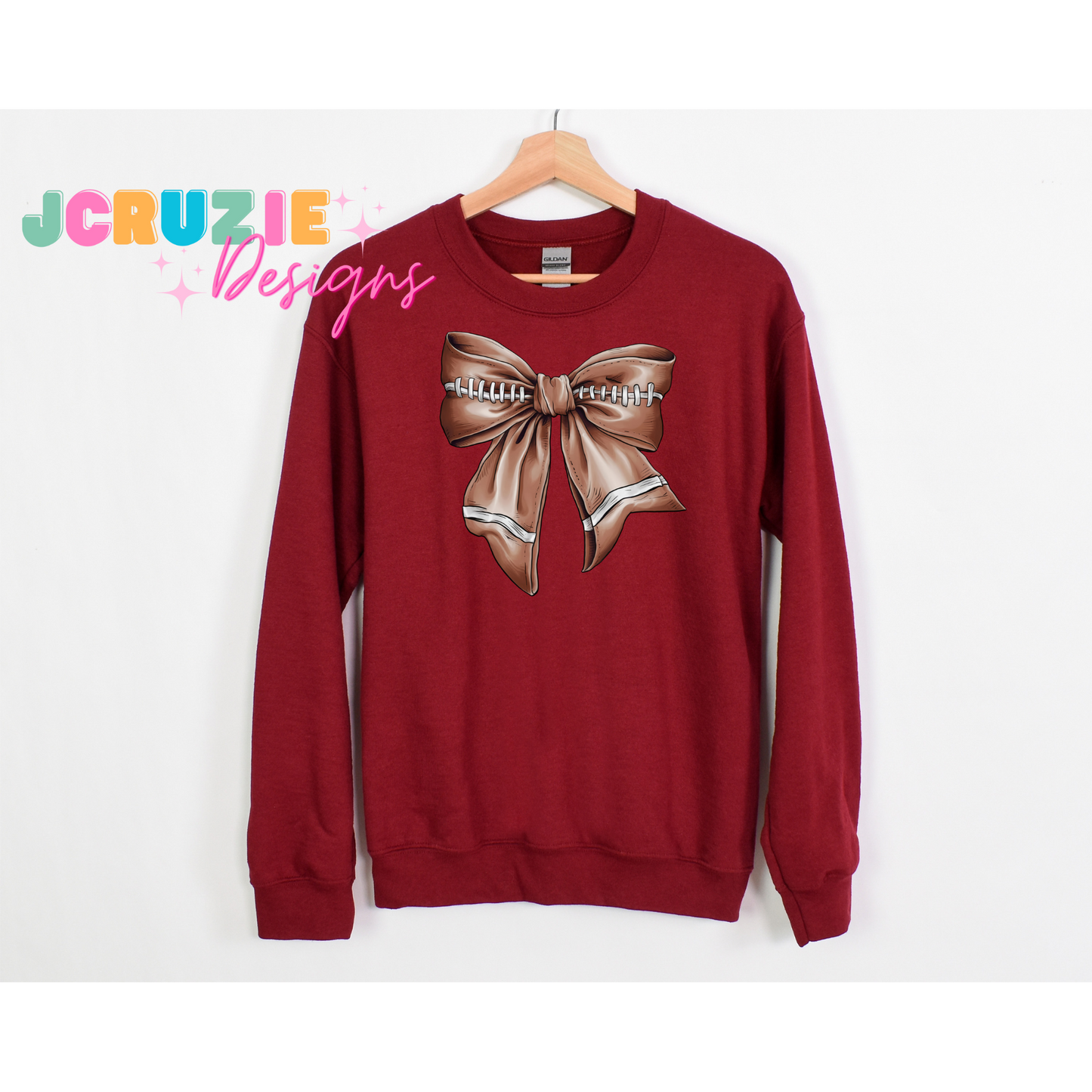 Coquette Football Bow Crewneck Sweater